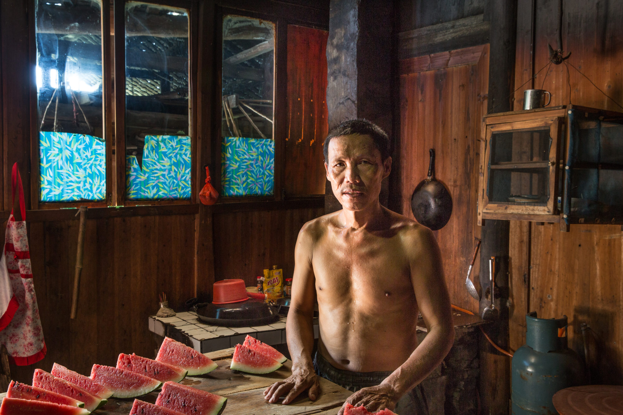 Foto di Un uomo nella sua casa di Fenghuang